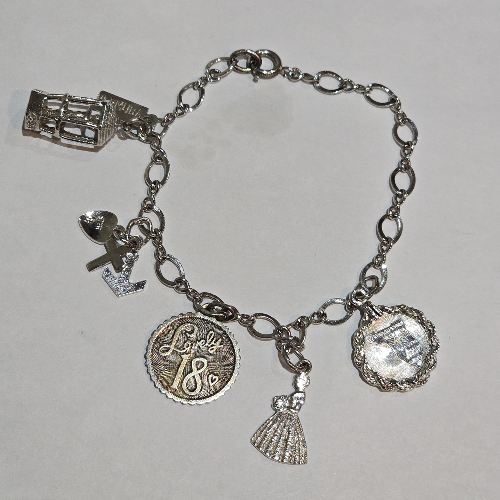 Sterling Silver Charm Bracelet with 10 Charms